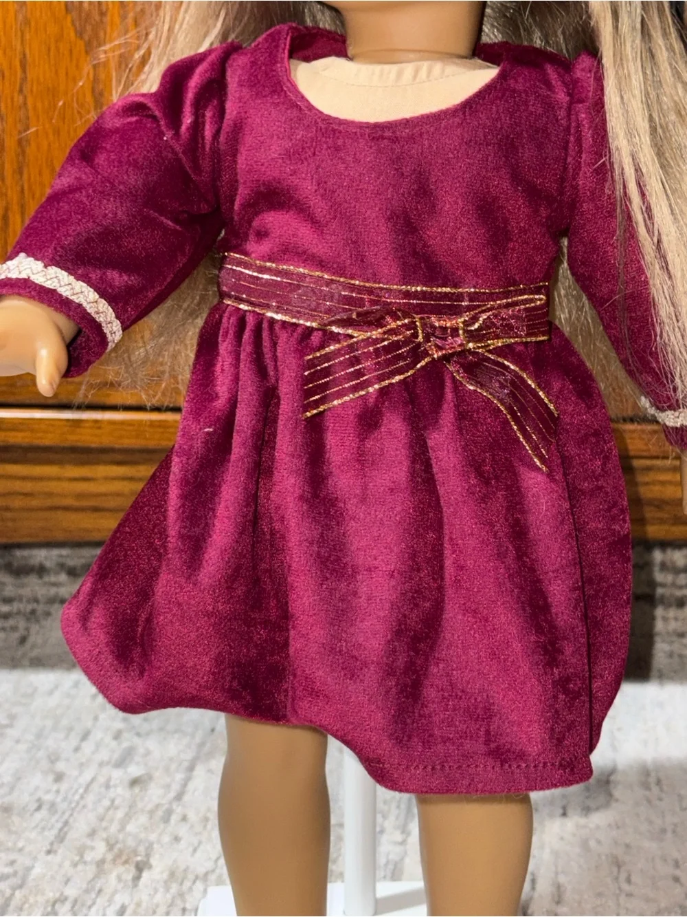18” doll maroon Velvet dress with gold bow sash around waist